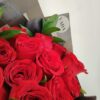12 Rosas rojas con dollar